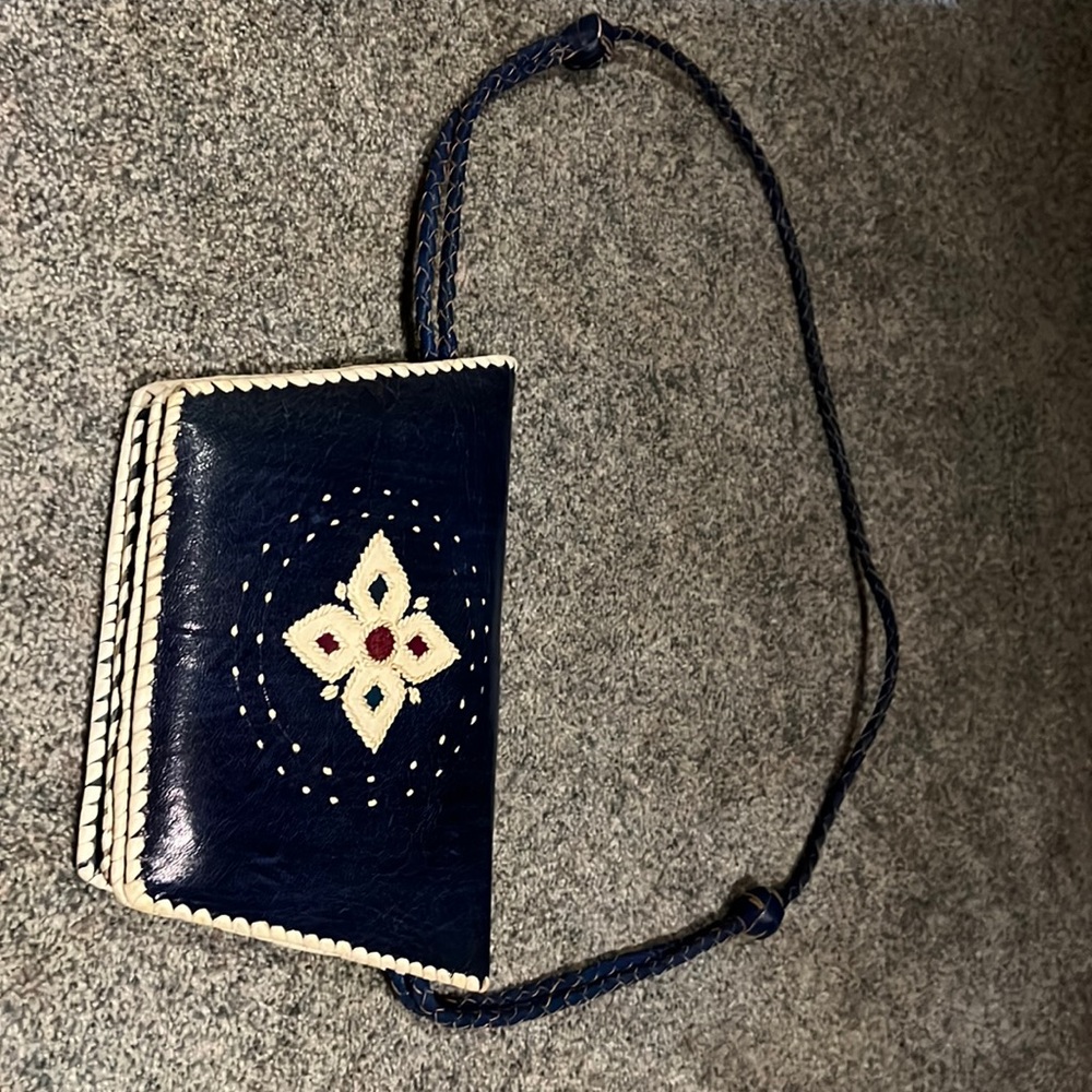 Shoulder purse, navy blue with woven detailing. 3 pockets, working clasp.